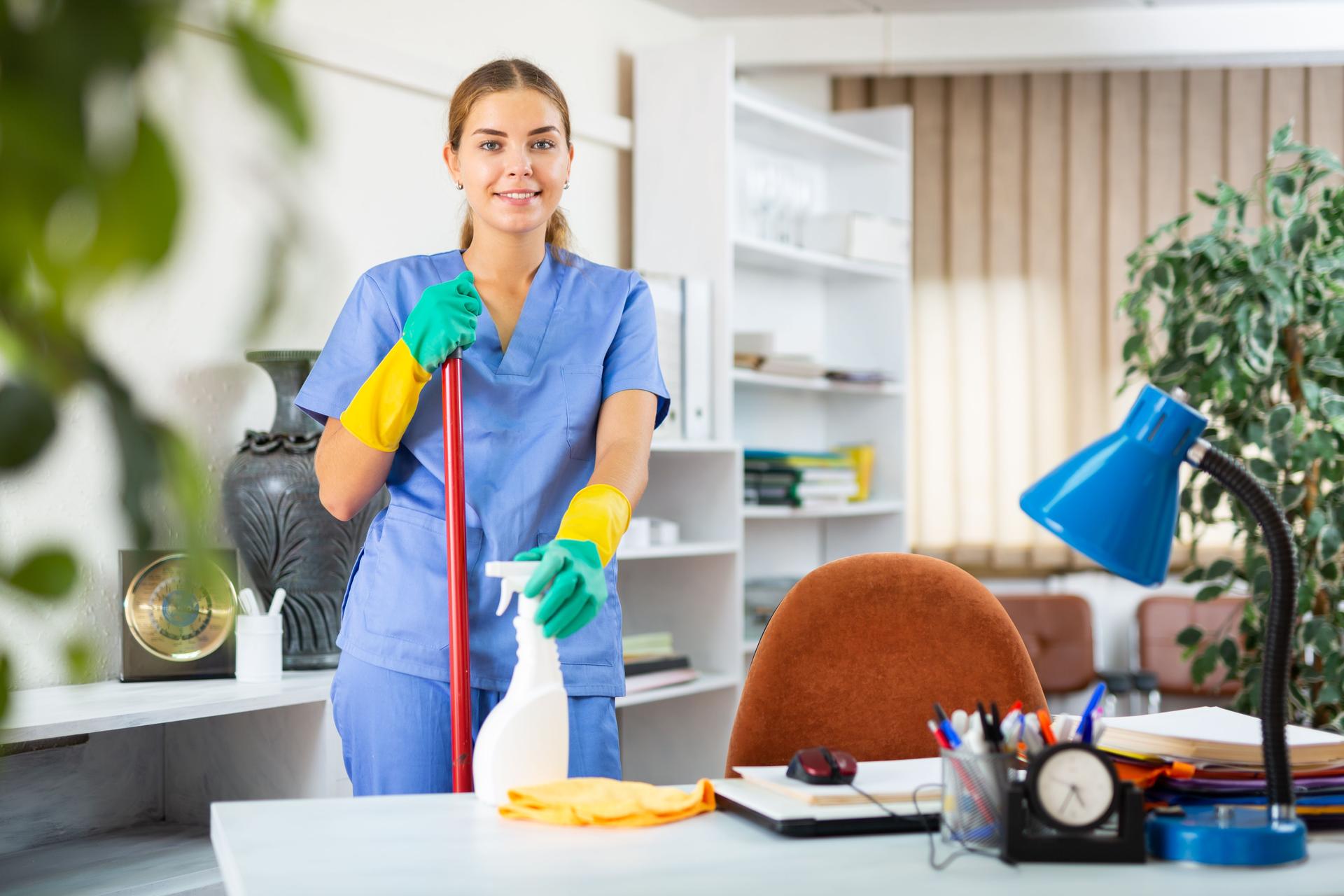 Woman cleaning floor with mop